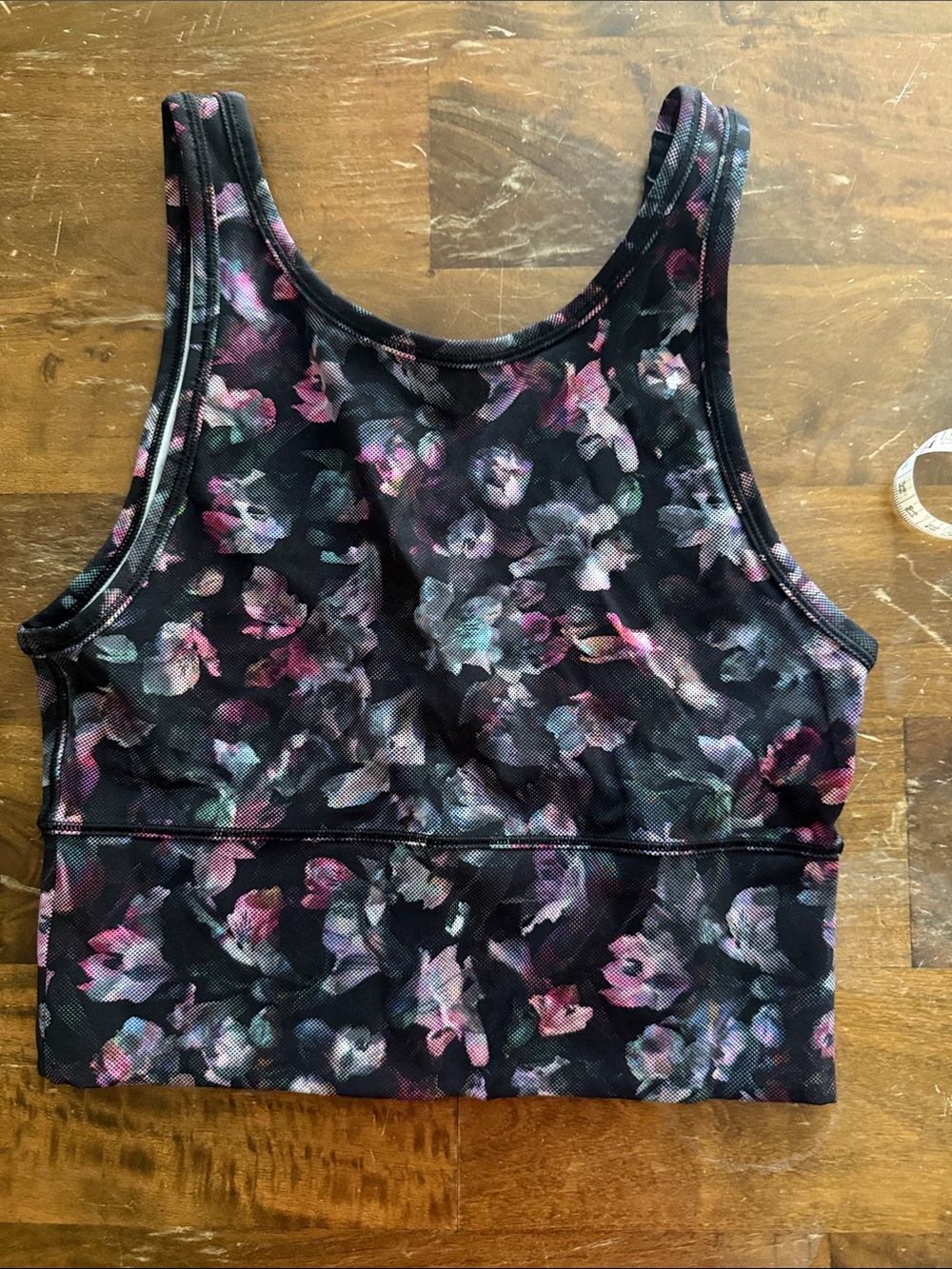 lululemon black sports bra with gray lining and multicolor trim